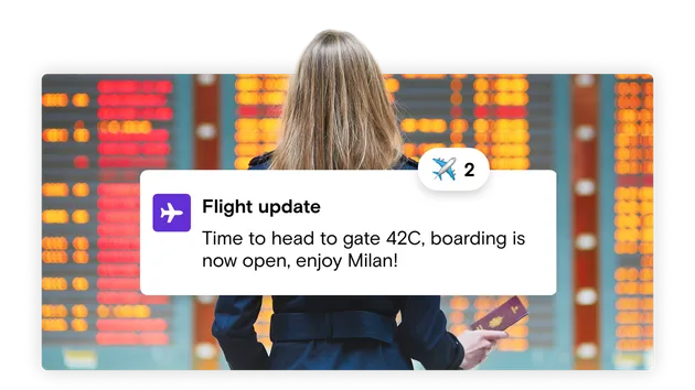 Woman reading flight updates with passport